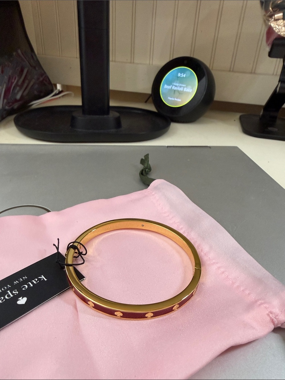 Beautiful burgandy and gold colored Kate Spade signature hinged braceletNWT